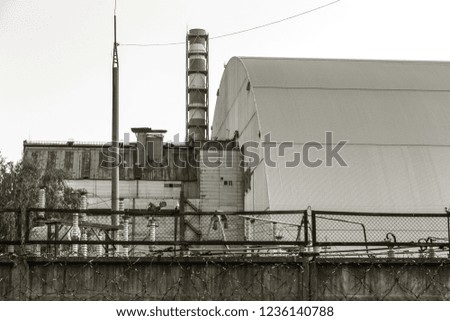 Reactor 4 at the Chernobyl nuclear power plant with a new confinement. Global atomic disaster. Chernobyl Exclusion Zone. Pripyat in the area of ​​the sarcophagus over a blasted nuclear reactor