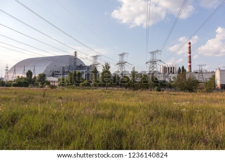 Reactor 4 at the Chernobyl nuclear power plant with a new confinement. Global atomic disaster. Chernobyl Exclusion Zone. Pripyat in the area of ​​the sarcophagus over a blasted nuclear reactor
