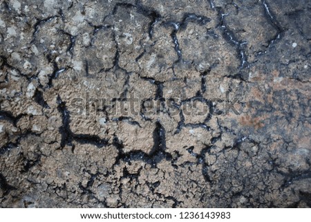 Cracks on roads covered with asphalt.