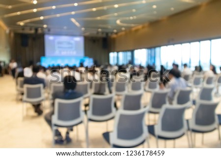 Abstract blur of conference hall or seminar room.