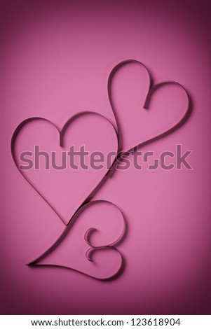 three paper hearts from above, valentines day background