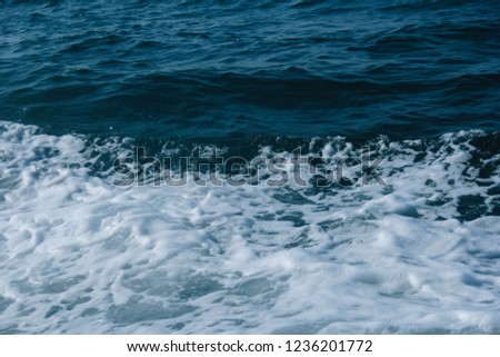 sea wave along way to the island