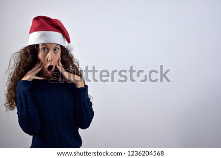 Excited Screaming and Surprised young pretty woman christmas concept. editable background