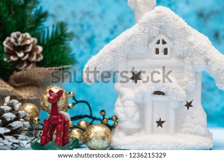 Christmas background with a festive decoration, white house. Frost with Christmas tree. Christmas decorations. New Year card. New Year's holidays