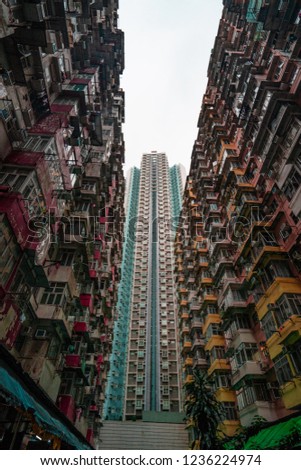 New building between old building. Old urban apartments in Hong Kong. Skyscapers quarry bay. 