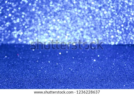 blue glitter lights christmas background. defocused