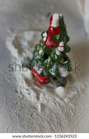 decoration christmas tree on white snowy background