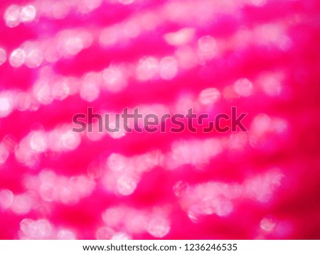 Abstract out of focus festive lights with abstract background of Red color. Abstract background of Red and White color. Good for Christmas and New Year celebrations. 