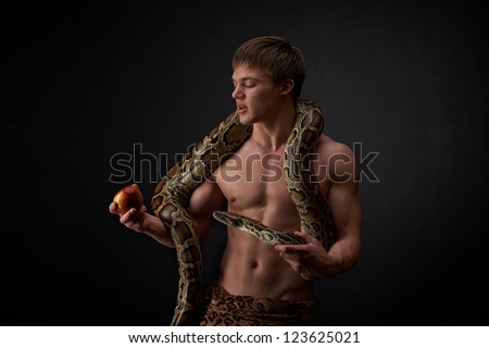 Huge snake on shoulders of men