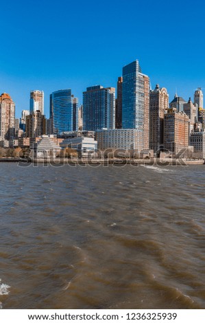 Manhattan Shore as seen from the river in New York City, United States of America.