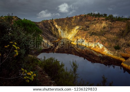 lake in an open pit mine