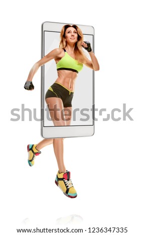 Portrait of professional smiling female runner running marathon, concept virtual reality of the smartphone. going out of the device. the original elements are transferred or removed.