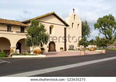 Mission Santa Ines in California exterior on sunny day with clouds