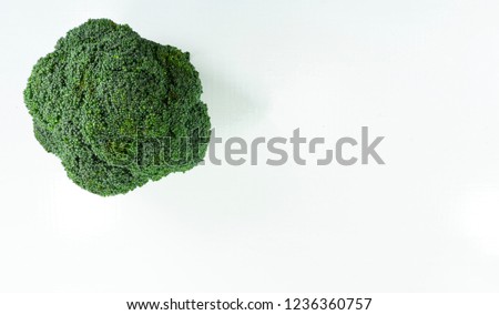 broccoli isolated on white background. vegan food.Top view, Copy space for design. 
