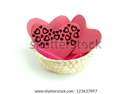 Hearts in a basket isolated on white background
