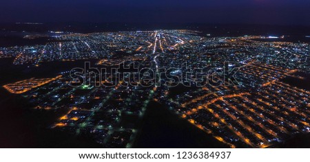 
Aerial photo taken from the city of Passos, Minas Gerais, Brazil, showing the whole urban area, with the wealth of lights and the traces of the streets
