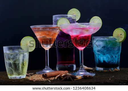 Selection of cocktails on old wooden background