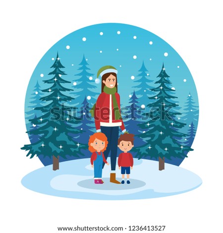 mother and kids with christmas clothes in snowscape