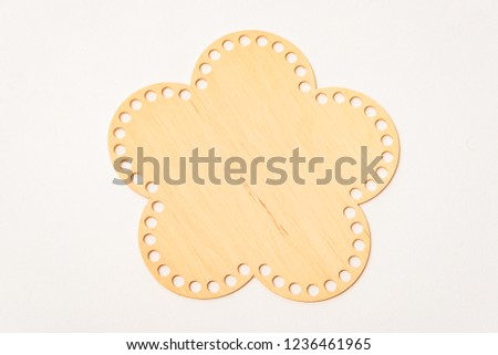Concept wooden geometric figure pattern on a white background.