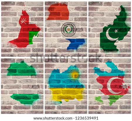 Old brick wall with graffiti of Oman, Paraguay, Pakistan, Nigeria, Rwanda, Azerbaijan flag and map