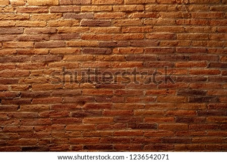 Brick wall urban and grunge texture background with different red tones colors, may use to interior design.  