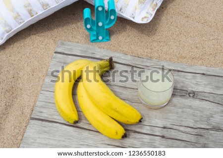 Banana picnic on the beach with lemonade