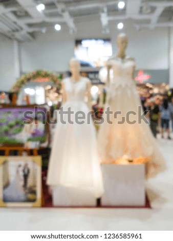 white wedding dress and bride and groom photo, blurred focus