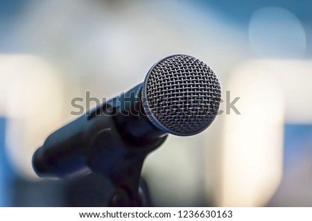 Microphone isolated closeup illustrative image for conference, convention, musical concert, public performance, show, music recording studio concept. Democracy, freedom of speech concept.