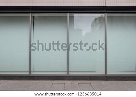 Shop Boutique Store Front with Big Window and Place for Name Royalty-Free Stock Photo #1236635014