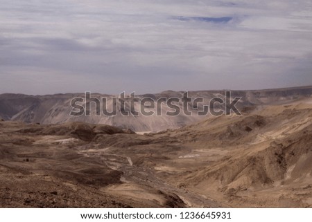 View on harsh bare dry valley - Cordillera de la Sal (Salt Mountains), Atacama desert