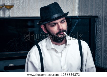 Retro man near the piano