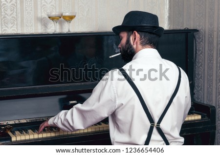 Retro man playing the piano