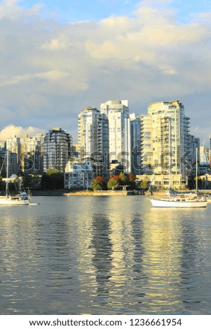 A Vertical sunny view of the Vancouver, Canada skyline
