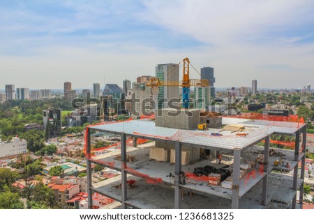 Towers under construction in Guadalajara, Mexico.  With panoramic view.