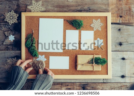 Top view of christmas letter in woman hand.