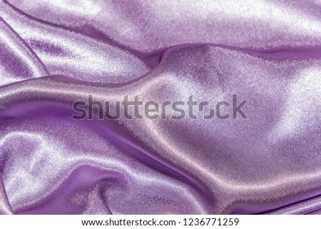 Beautiful smooth elegant wavy violet purple satin silk luxury cloth fabric texture, abstract background design. Card or banner. sewing material abstraction