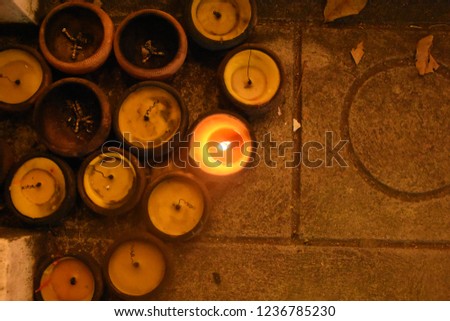 Top view of Candle light Lanna style in Thai temple at night during Loy Krathong festival in Chiang Mai, Thailand. Beautiful culture in the north of Thailand.