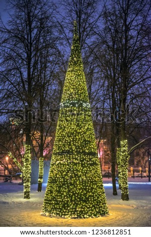 Decorative christmas tree with illumination on street