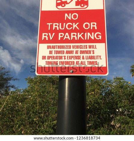 Sign in grocery store parking lot:  No Truck or RV Parking