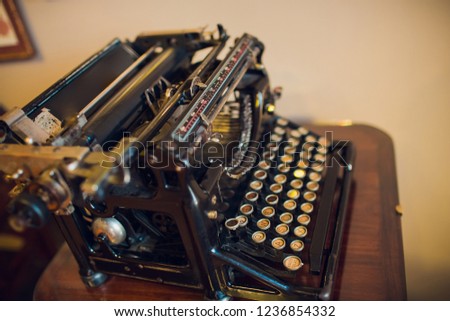 Old typewriter on wood
