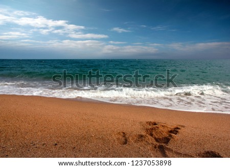 sandy beach under cloudy sunny skies as a place to travel