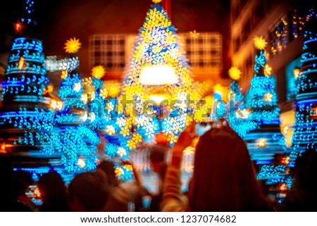 People in Christmas lighting show 
