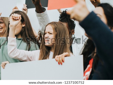 Group of angry female activists is protesting Royalty-Free Stock Photo #1237100752