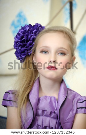 Beautiful teenager in purple dress