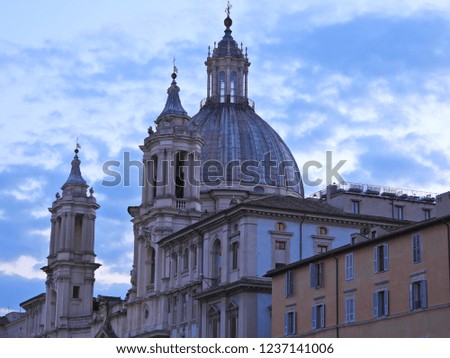 Zoom photo of iconic architectural masterpieces in piazza Navona as seen at dusk, Rome, Italy