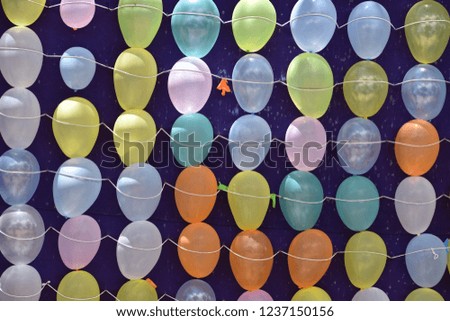Balloons tied on rope in blue screen for shooting or Balloons pattern