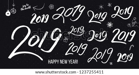 Vector illustration. Set of white typographic hand drawn vintage 2019 numbers for Your poster or card design. With joy to the world and Happy new year text and various winter holidays symbols.