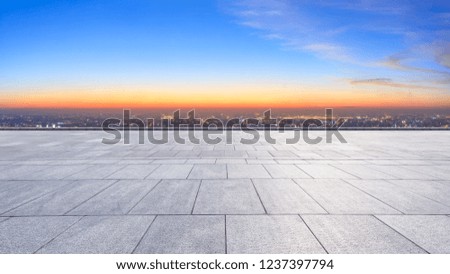 Panoramic city skyline and buildings with empty square floor