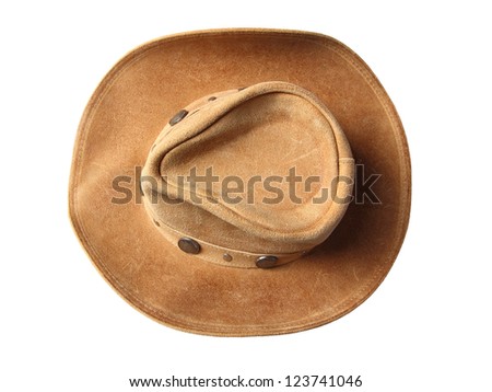 Top view of beige cowboy hat, decorated of coins isolated on a white background