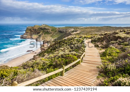 A route from Cape Point to Cape of Good Hope in sunny day. Western Cape province, South Africa. Royalty-Free Stock Photo #1237439194